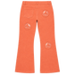 Back of GOOUNIES coral jeans showing three circular face patches and one rear pocket.