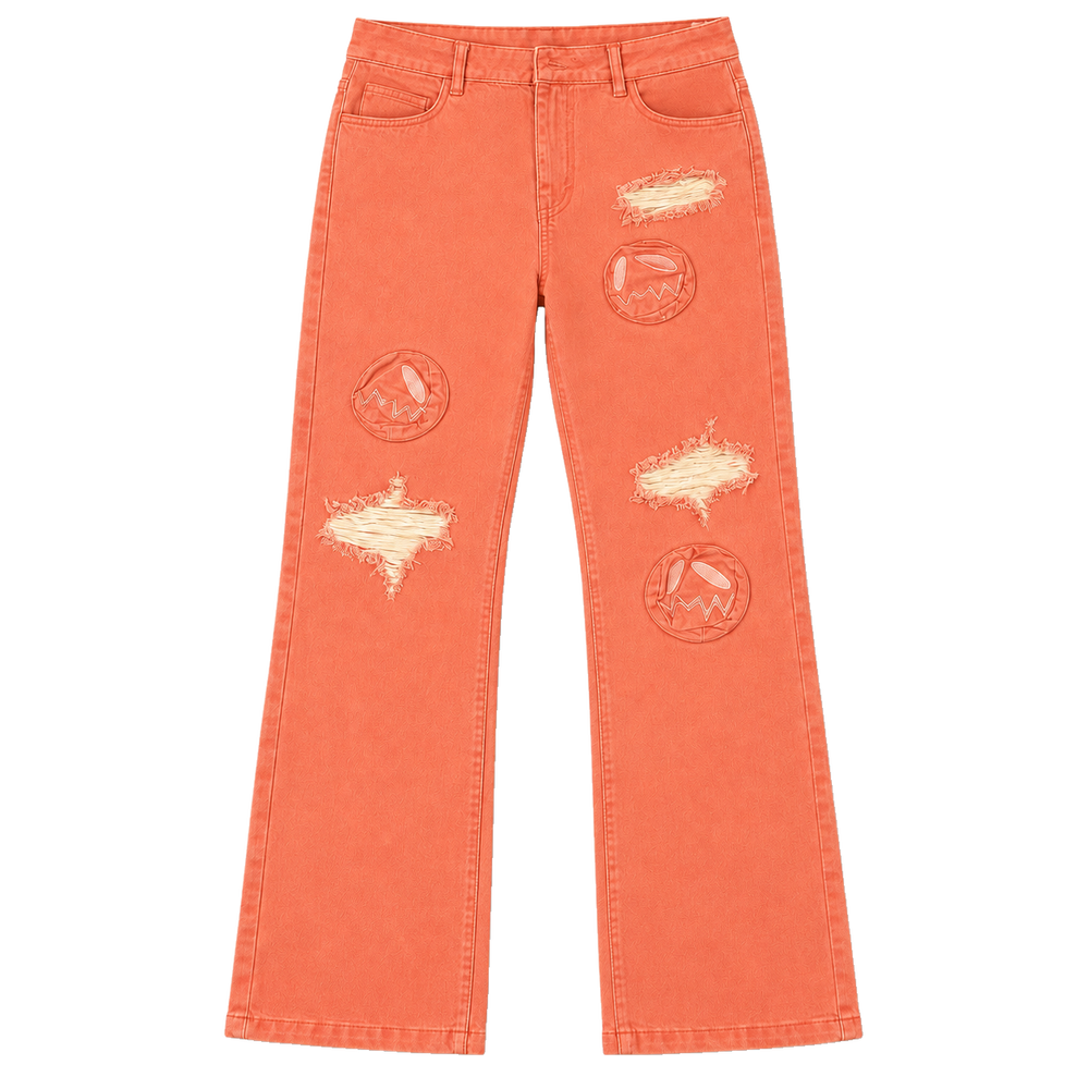Front of GOOUNIES coral jeans with face patches, distressed openings and wide leg hems.
