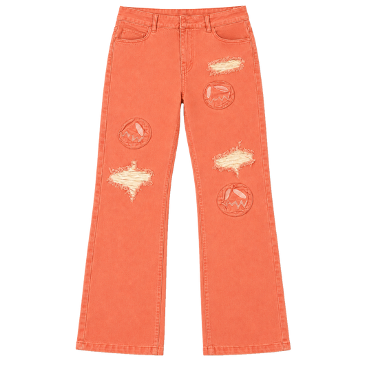Front of GOOUNIES coral jeans with face patches, distressed openings and wide leg hems.