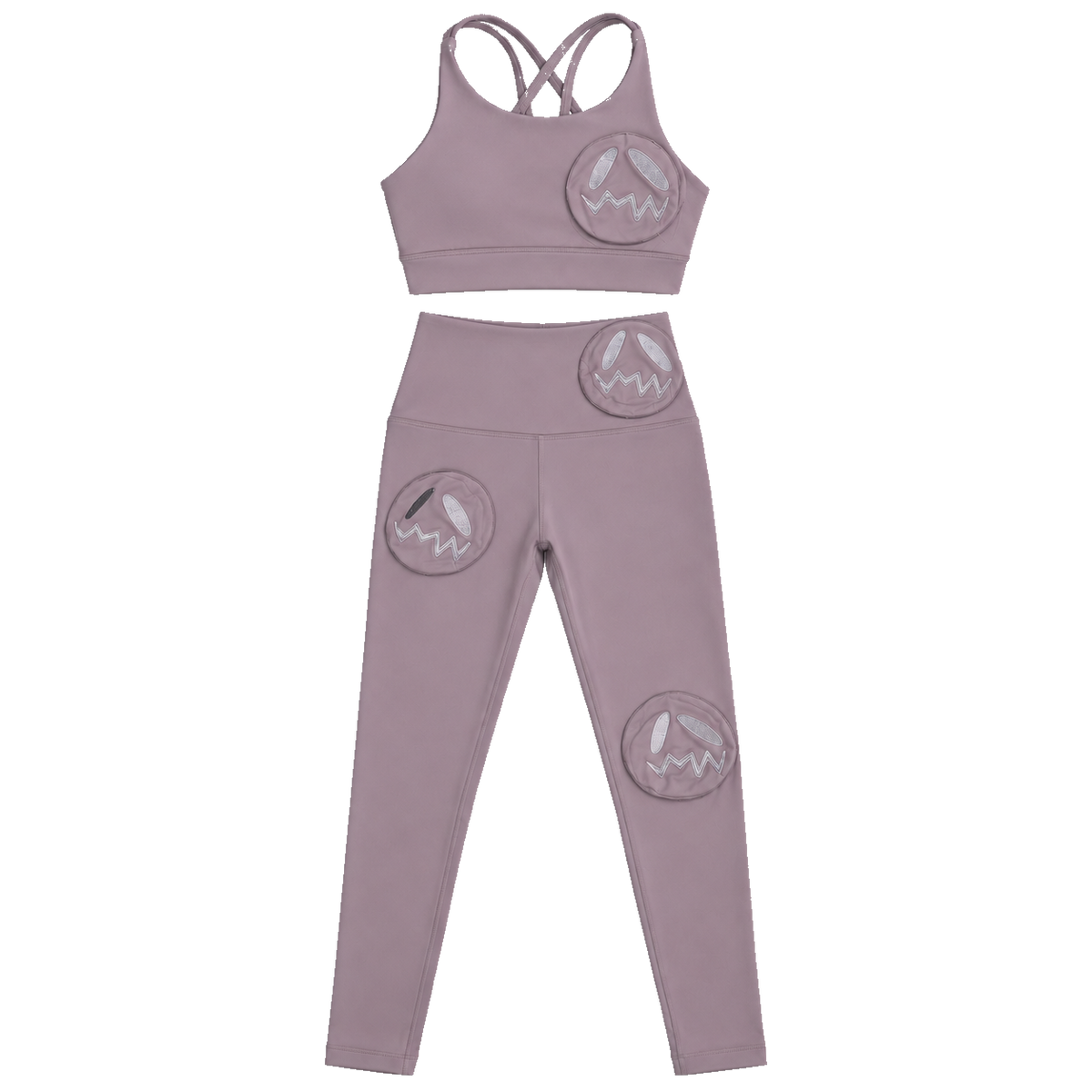 GOOUNIES mauve crop top and leggings set with circular embroidered face patches.