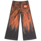 Back view of GOOUNIES orange and charcoal wide-leg jeans with rear pockets and an orange face patch
