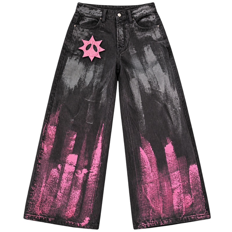 Front view of GOOUNIES black wide-leg jeans with pink and gray brushstroke detailing and a pink face patch
