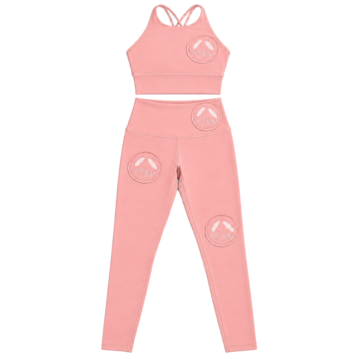 GOOUNIES pink crop top and leggings set with matching circular face patches and pale embroidery.